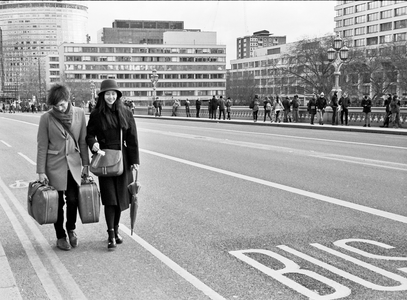 Young hipster couple walking through time