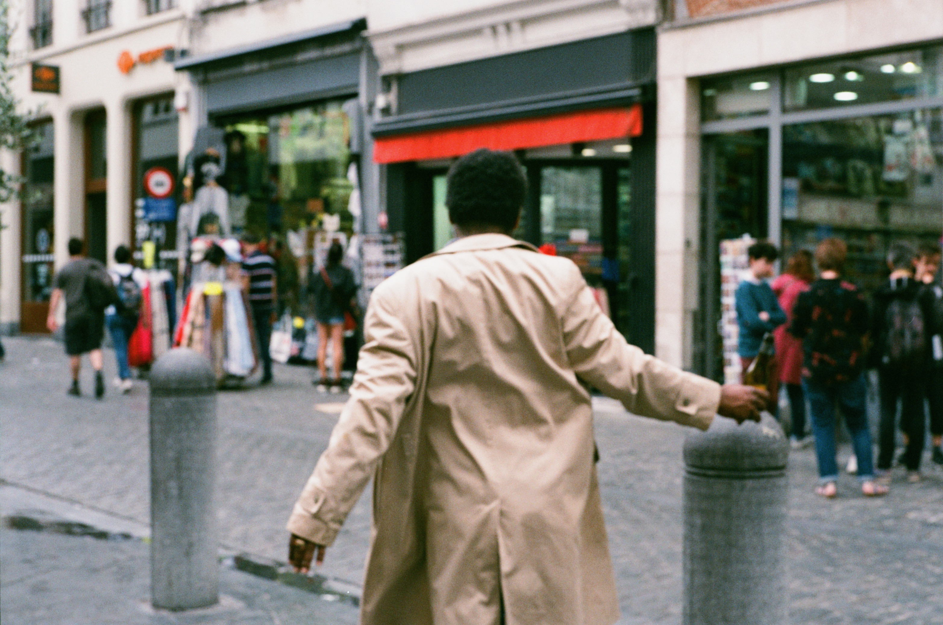 Drunk man singing and dancing in Brussels